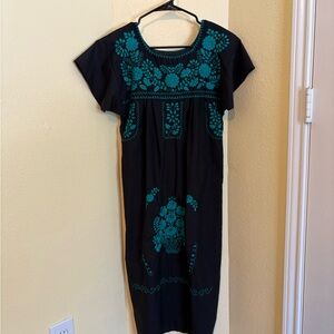 Chic Black Dress with Teal Floral Design